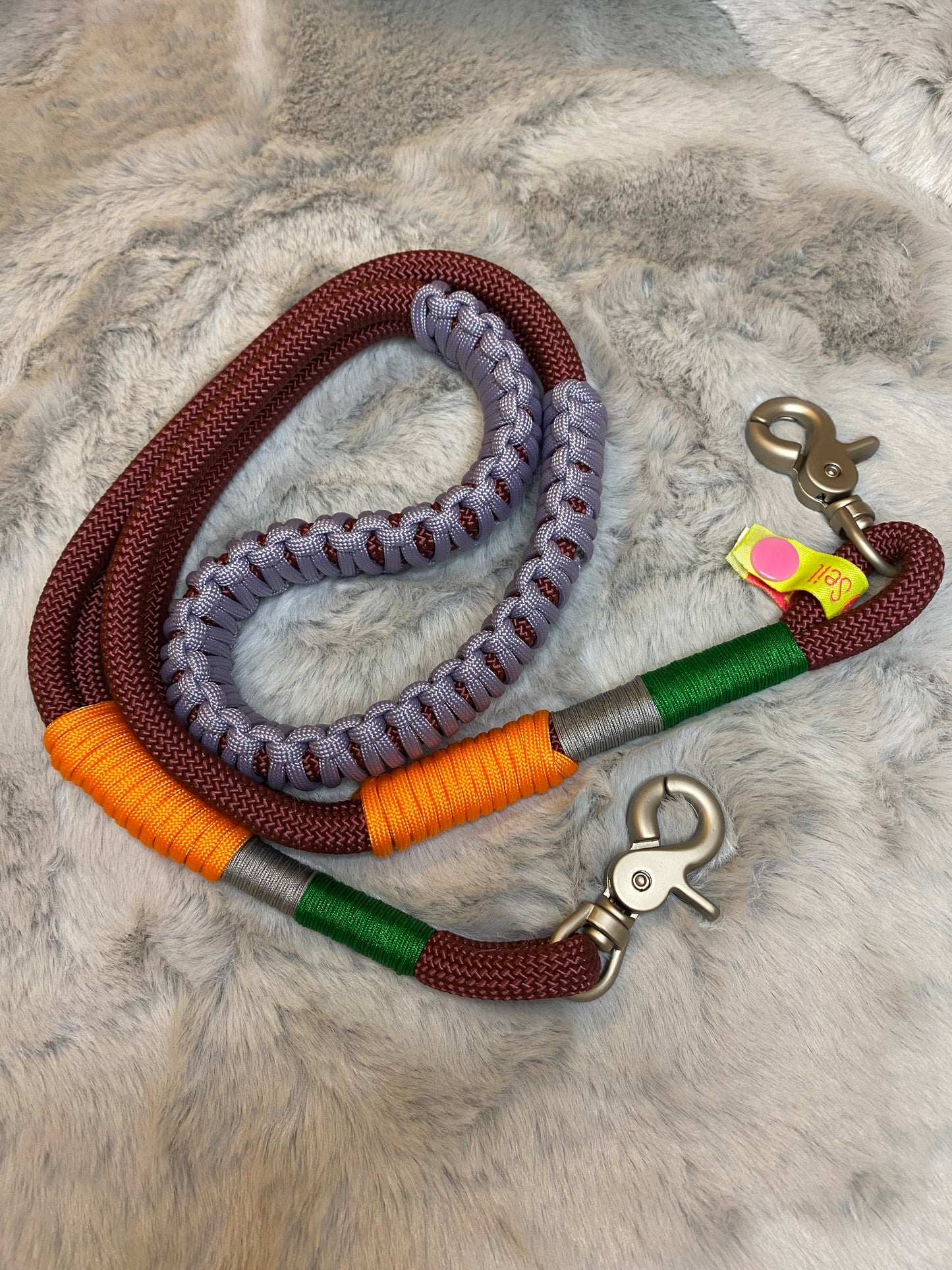 Taschengurt kurz Aubergine trifft Orange aus Paracord & Segeltau